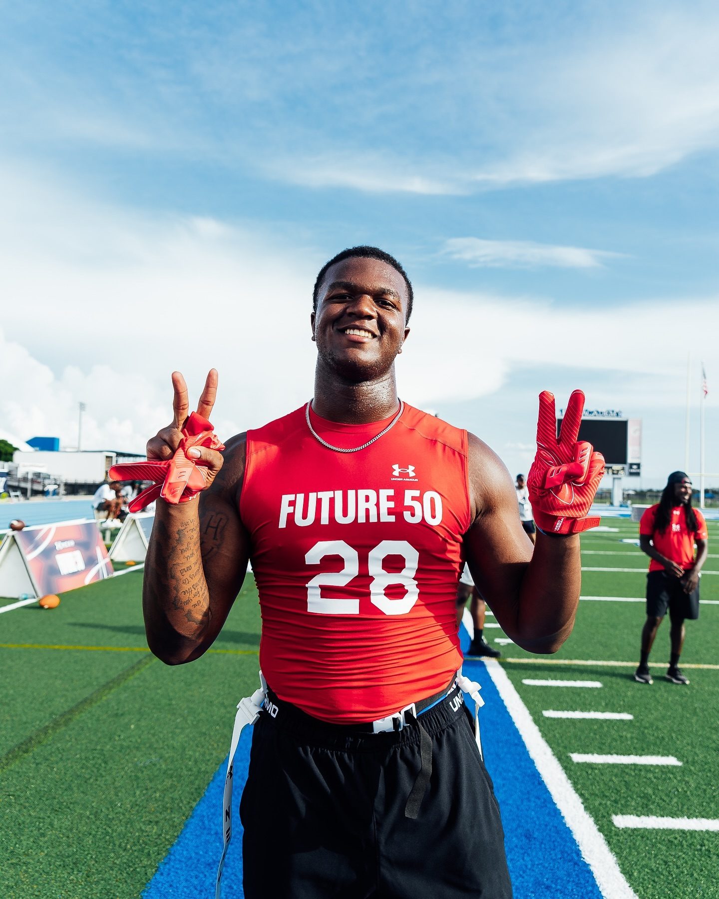 Athlete celebrating at a football camp